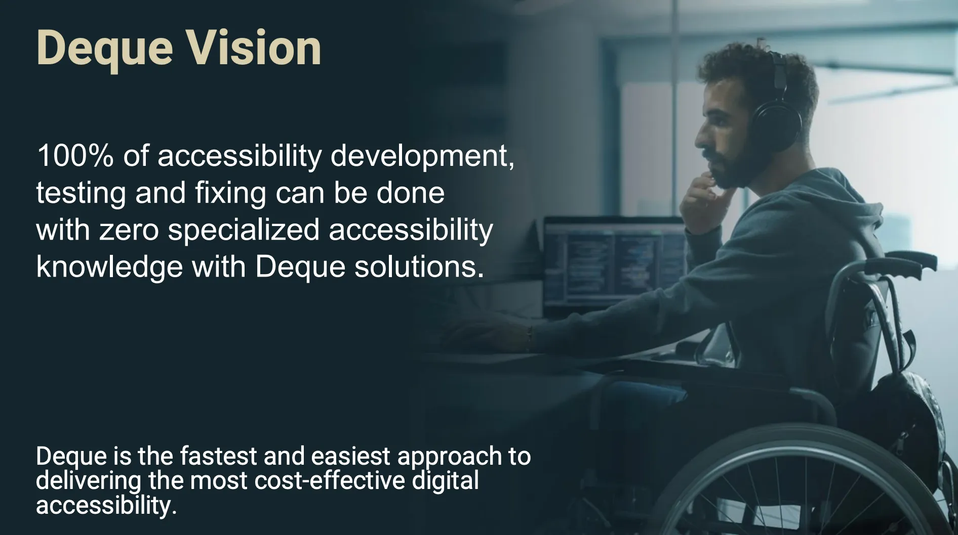 A presentation slide showing a bearded person in a wheelchair working at a computer. The text on the slide reads: Deque Vision. 100% of accessibility development, testing and fixing can be done with zero specialised accessibility knowledge with Deque solutions.